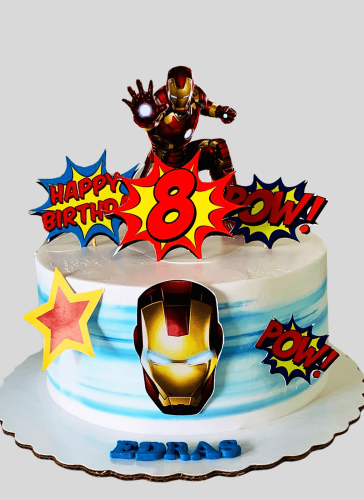 Iron Man Cake with Iron Man Toy on Top and Red Yellow Blue Base